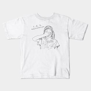 Little girl counting while playing hide and seek Kids T-Shirt